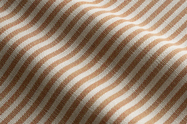 Close-up of ORANGE and white striped fabric texture