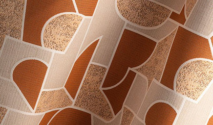 Close-up of fabric with a pattern of hearts in brown and beige tones.