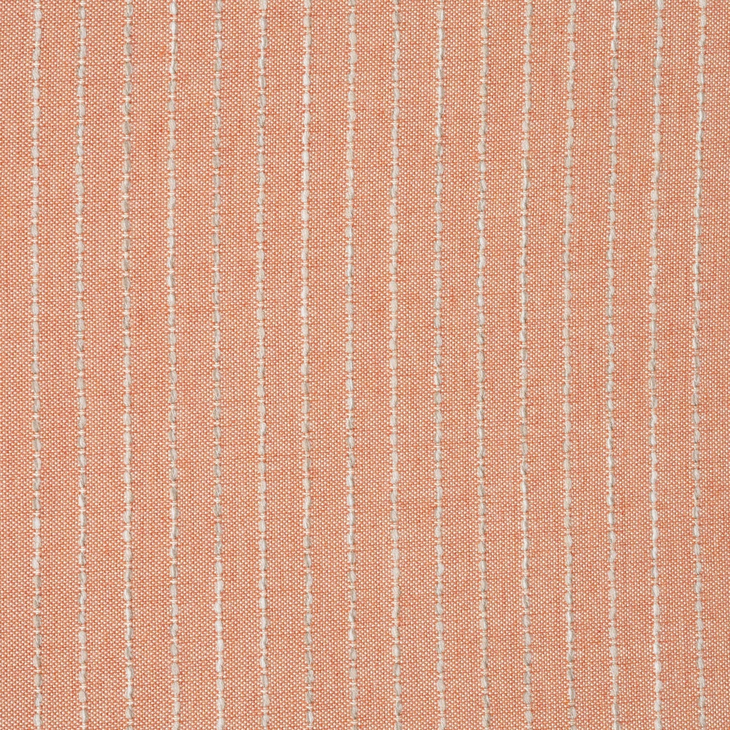 Textured fabric with thin white lines on a peach background