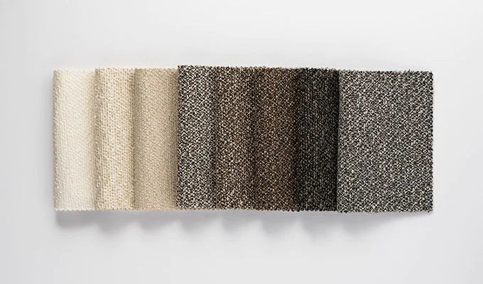 Textured strip swatch in beige, brown, and black on a light gray background