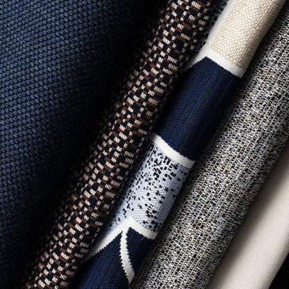 Close-up of various textured fabric swatches in different colors.