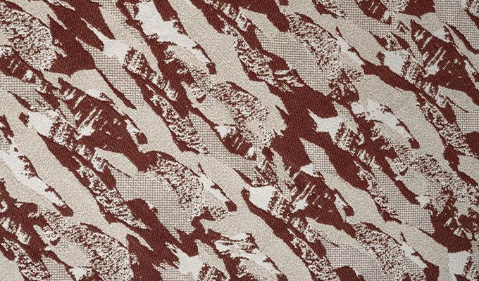 Textured fabric pattern with brown and beige colors