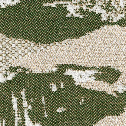 Close-up of a camouflage pattern with green, beige, and white colors.
